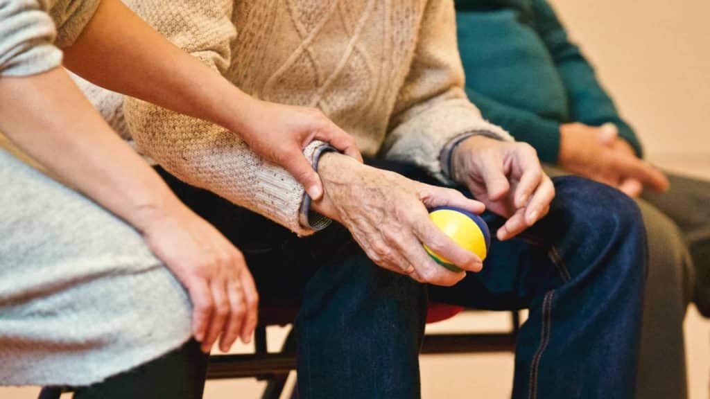 Elderly Man With Support Worker