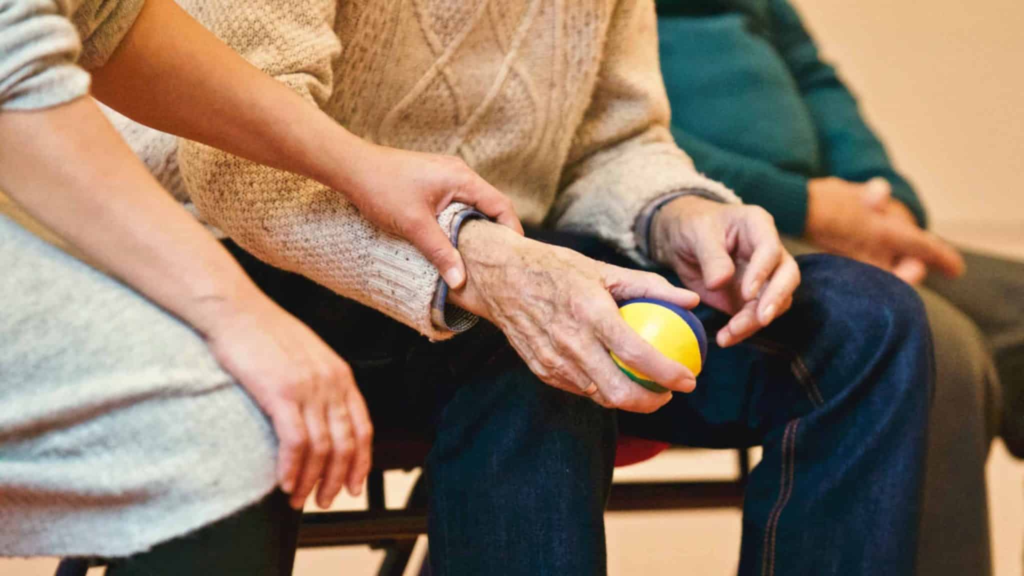 Elderly Man With Support Worker