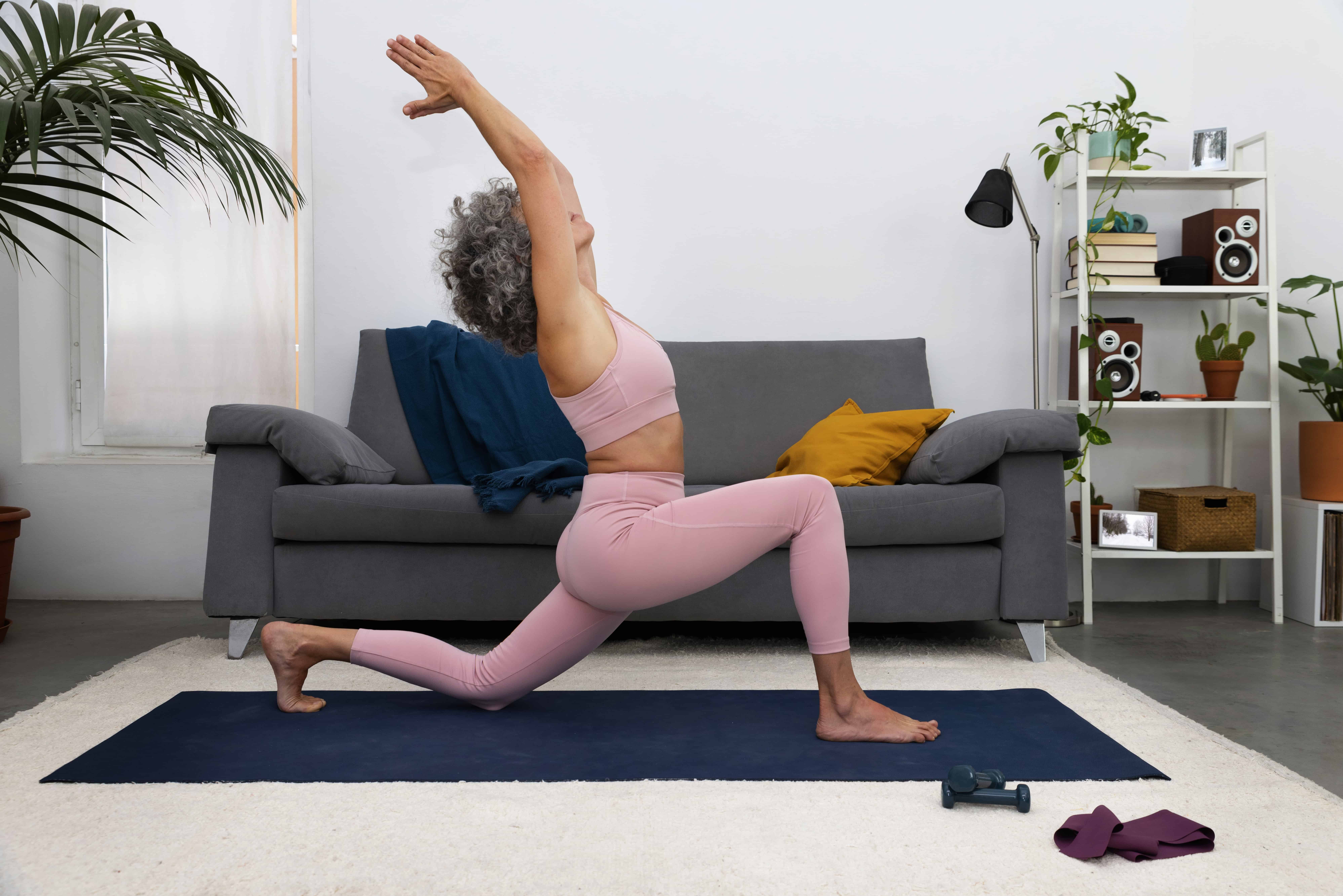 Elderly Woman Exercising At Home